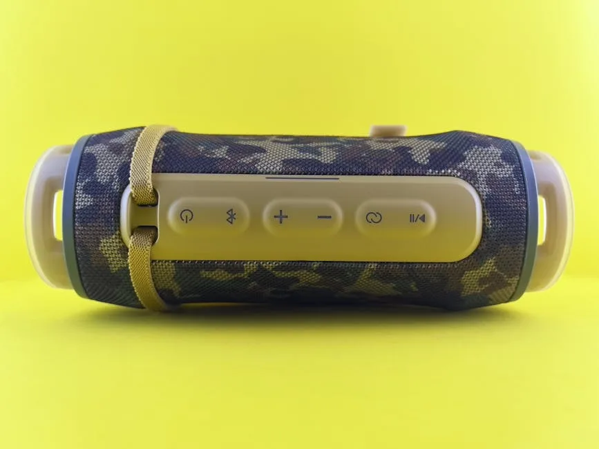 Close-up of a portable Bluetooth speaker by a window