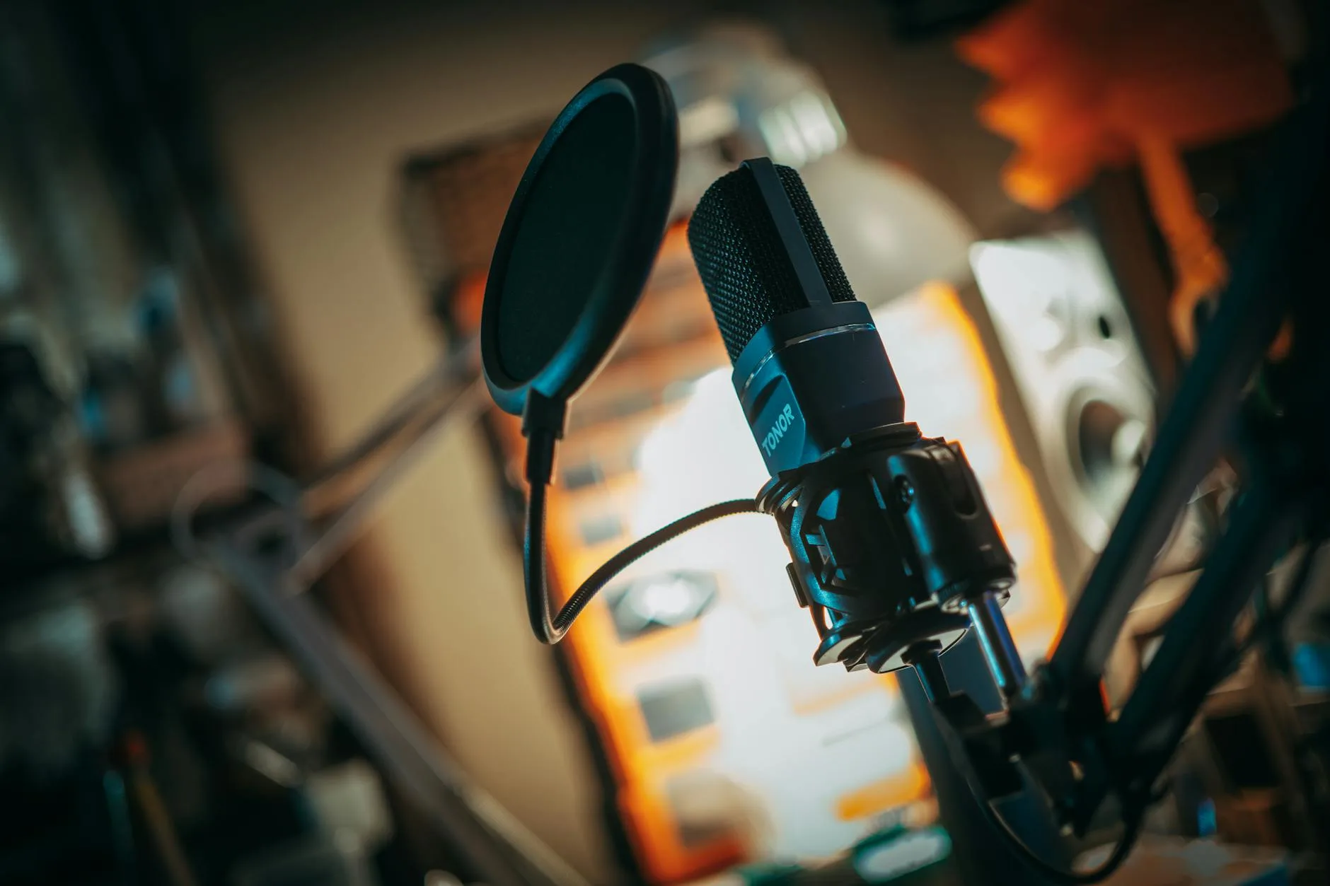 Close-up of a condenser microphone in a recording setup