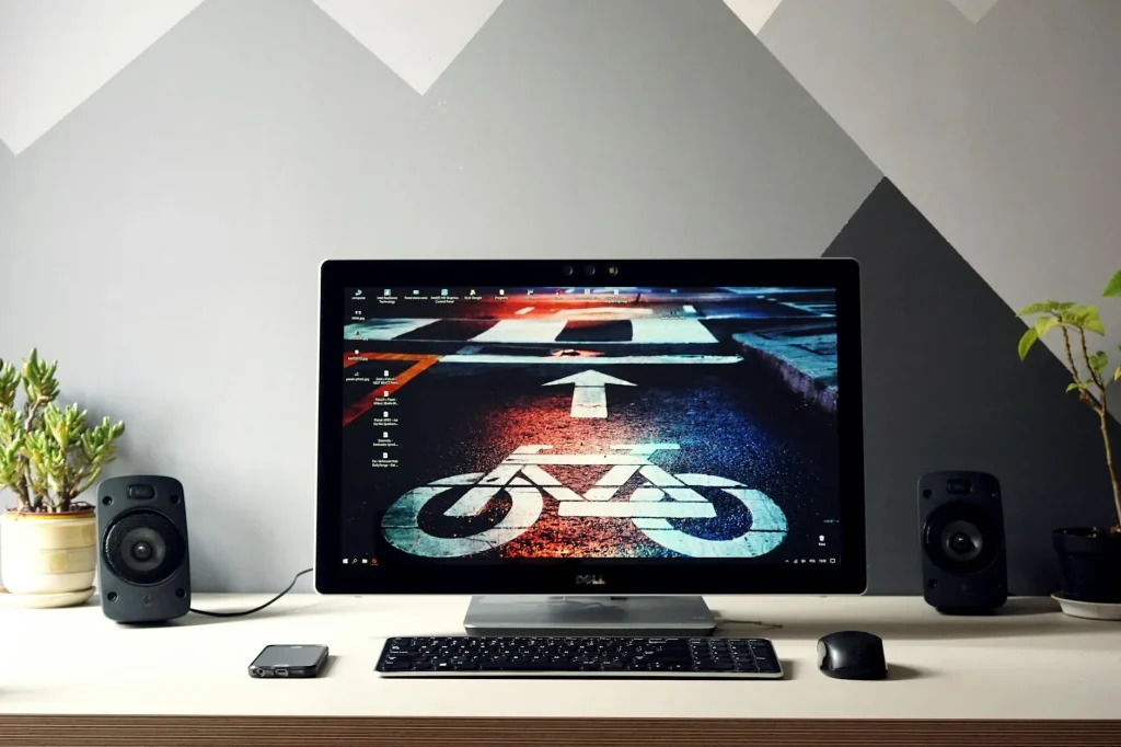 Desktop 2.1 speaker system with bookshelf speakers and subwoofer on a desk
