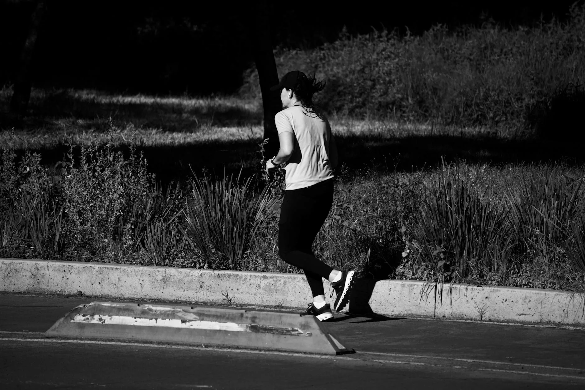 Runner on a road during morning exercise session