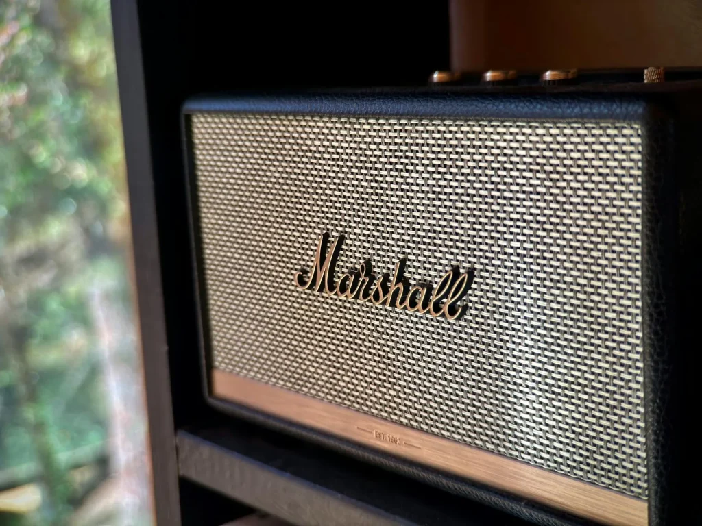 Pair of bookshelf speakers on a shelf for small room audio