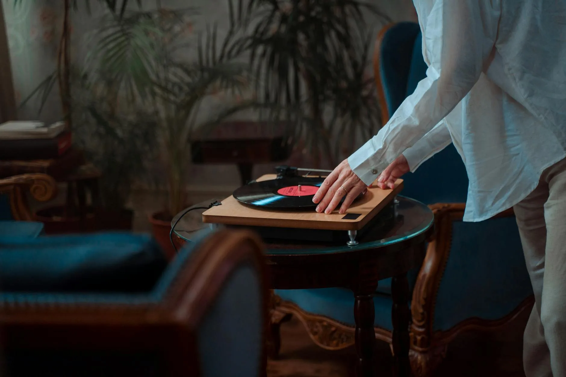 Turntable playing vinyl in a small listening room