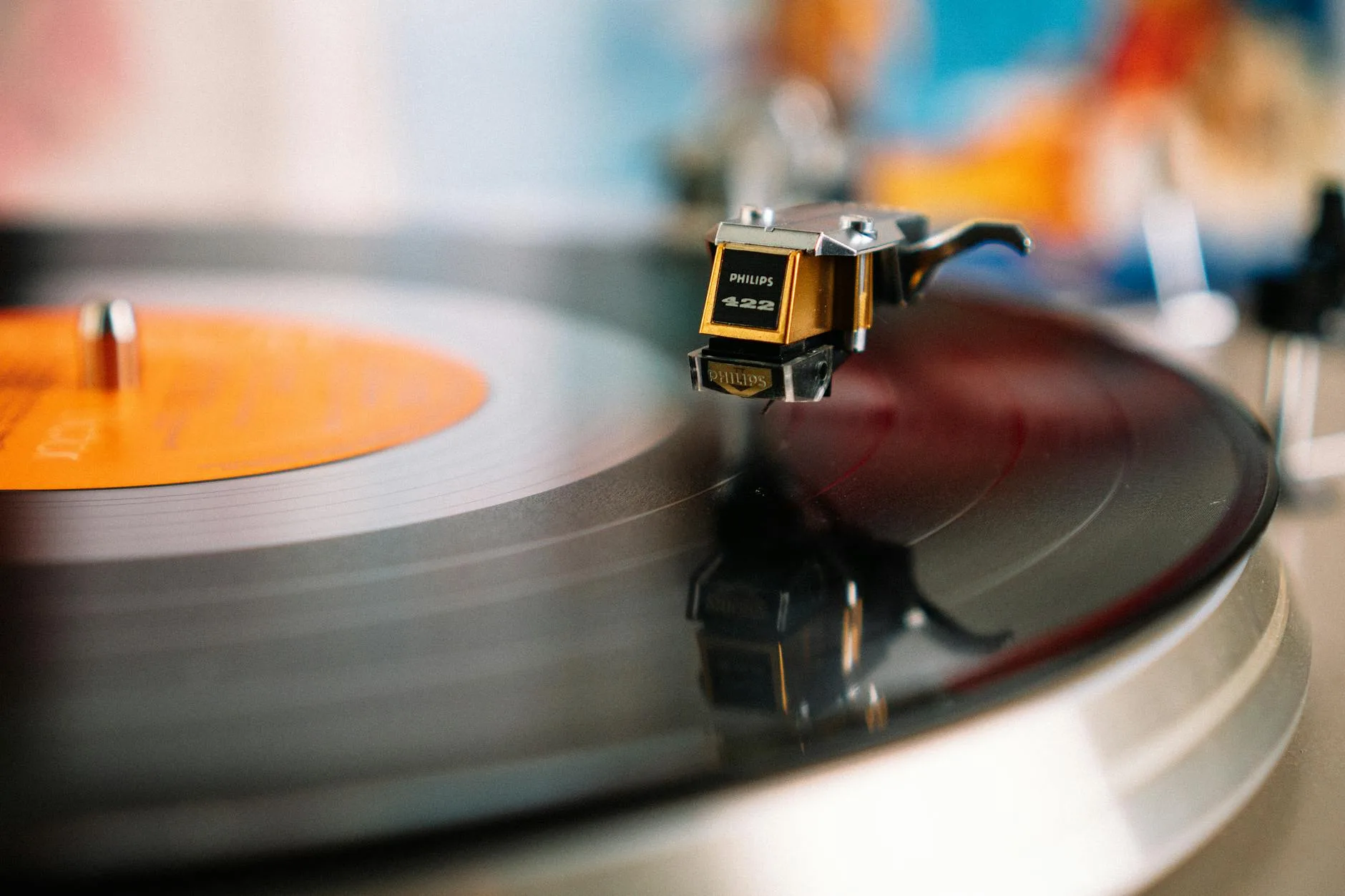 Vinyl turntable alongside modern streaming setup