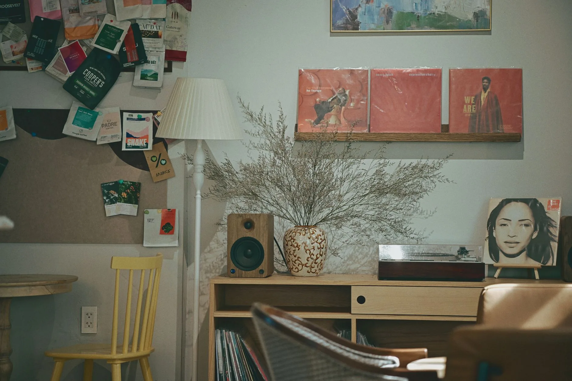 Turntable and speakers arranged in a living room listening setup